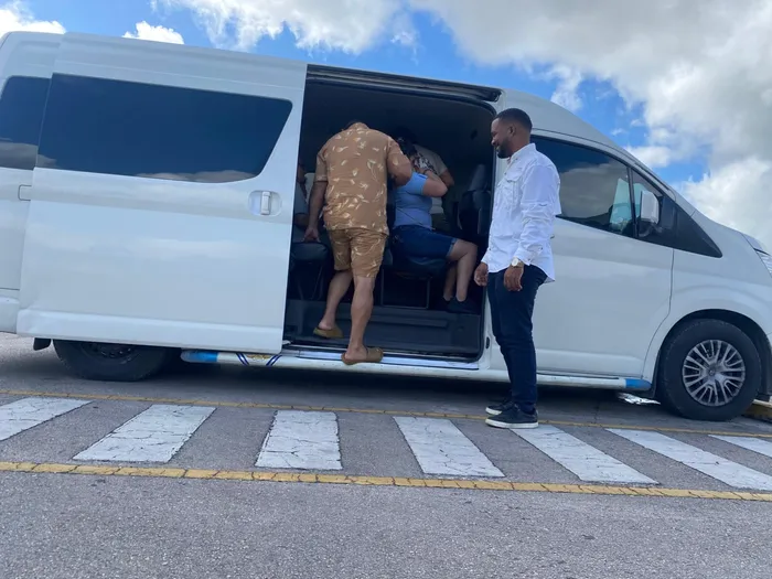 Customer support team assisting with transfer booking